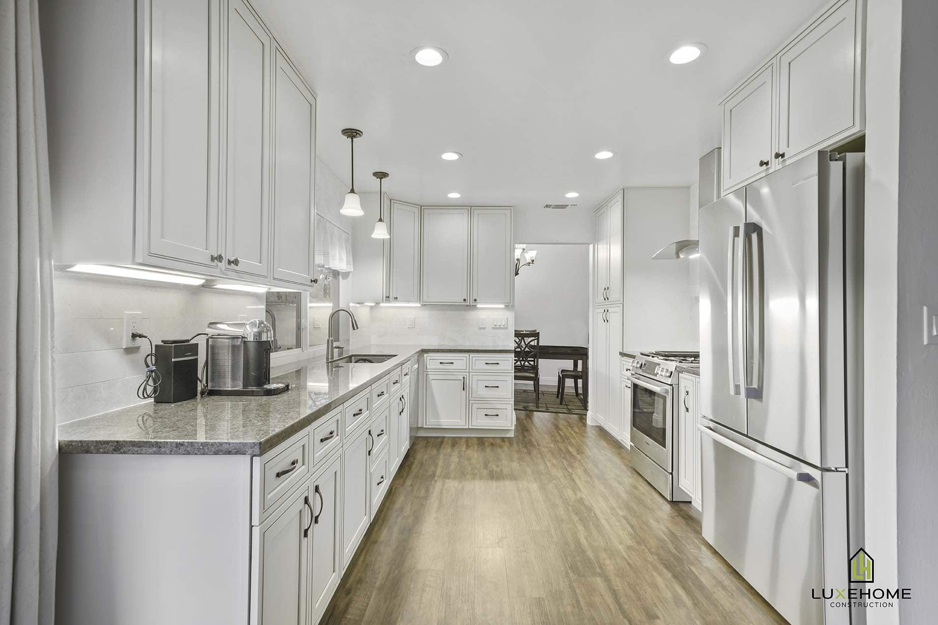 Orangevale, CA kitchen remodel with strategic lighting placement for a brighter all-white kitchen.
