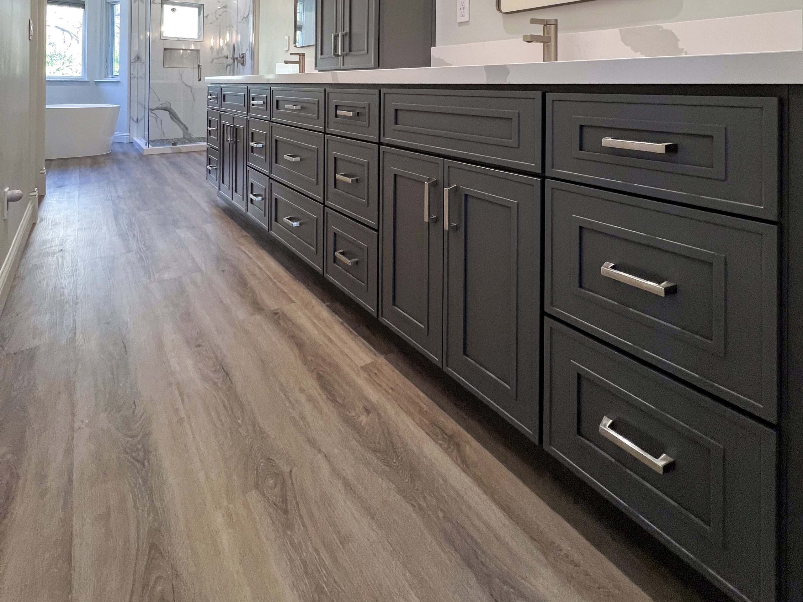 Custom dual-sink vanity with extended storage and quartz countertop in a Granite Bay, CA 95746 bathroom remodel