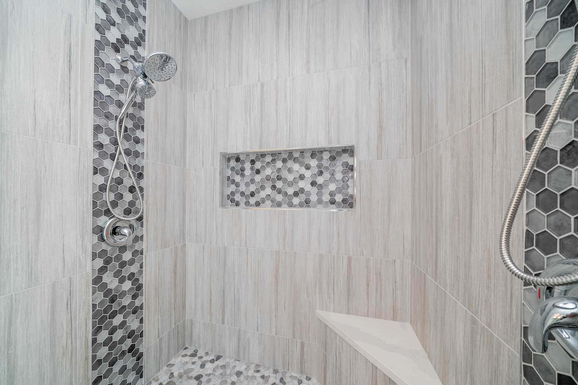 Custom tiled walk-in shower detail in Sacramento, CA 95831 master bathroom