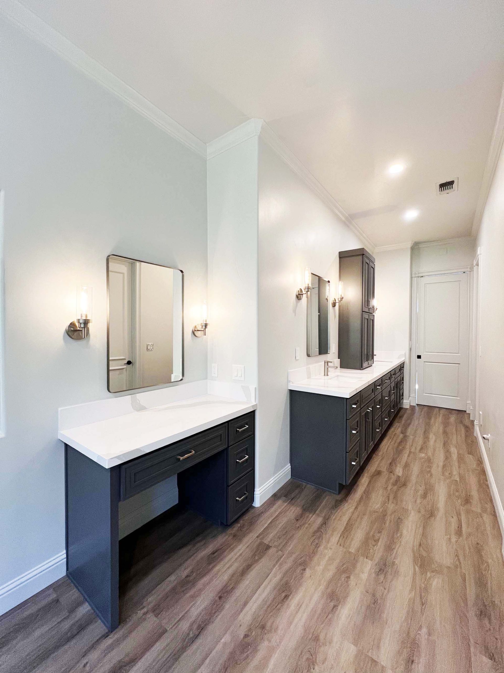 Dedicated makeup vanity and dual-sink bathroom layout with durable flooring in Granite Bay, CA 95746