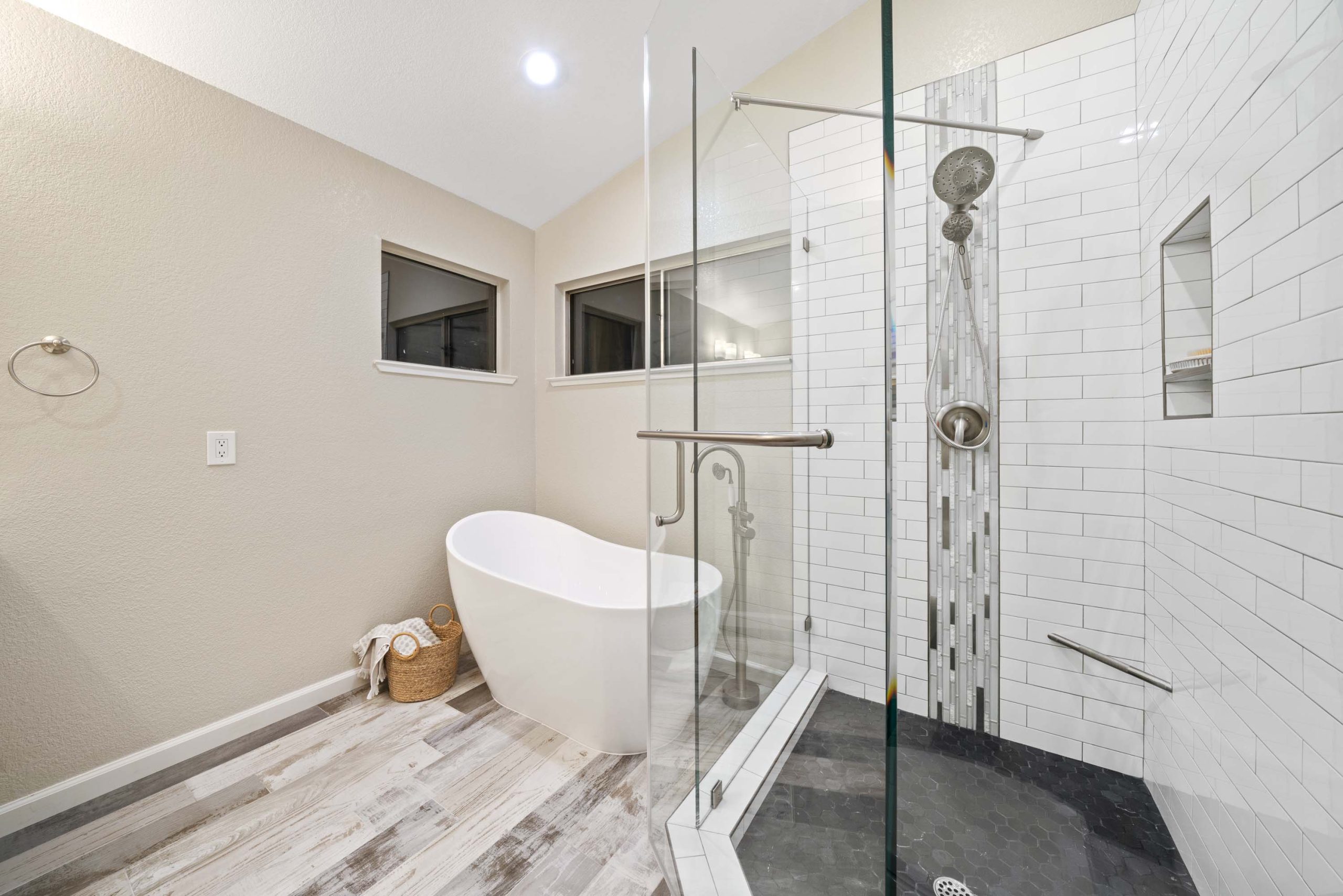 Freestanding tub adjacent to glass-enclosed shower in Roseville, CA 95678