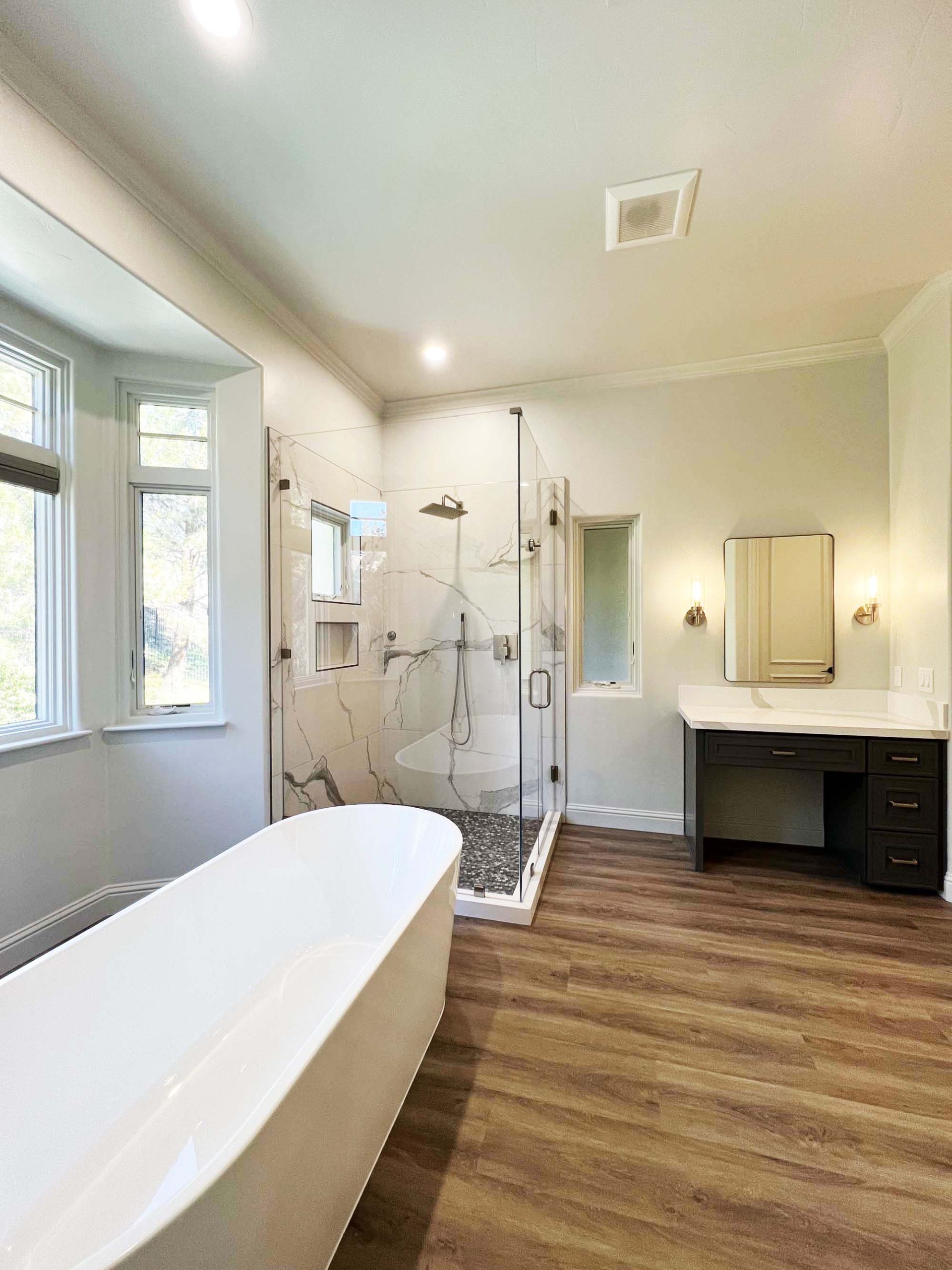 Master bathroom layout featuring a freestanding tub, walk-in shower, and dedicated vanity area in Granite Bay, CA 95746