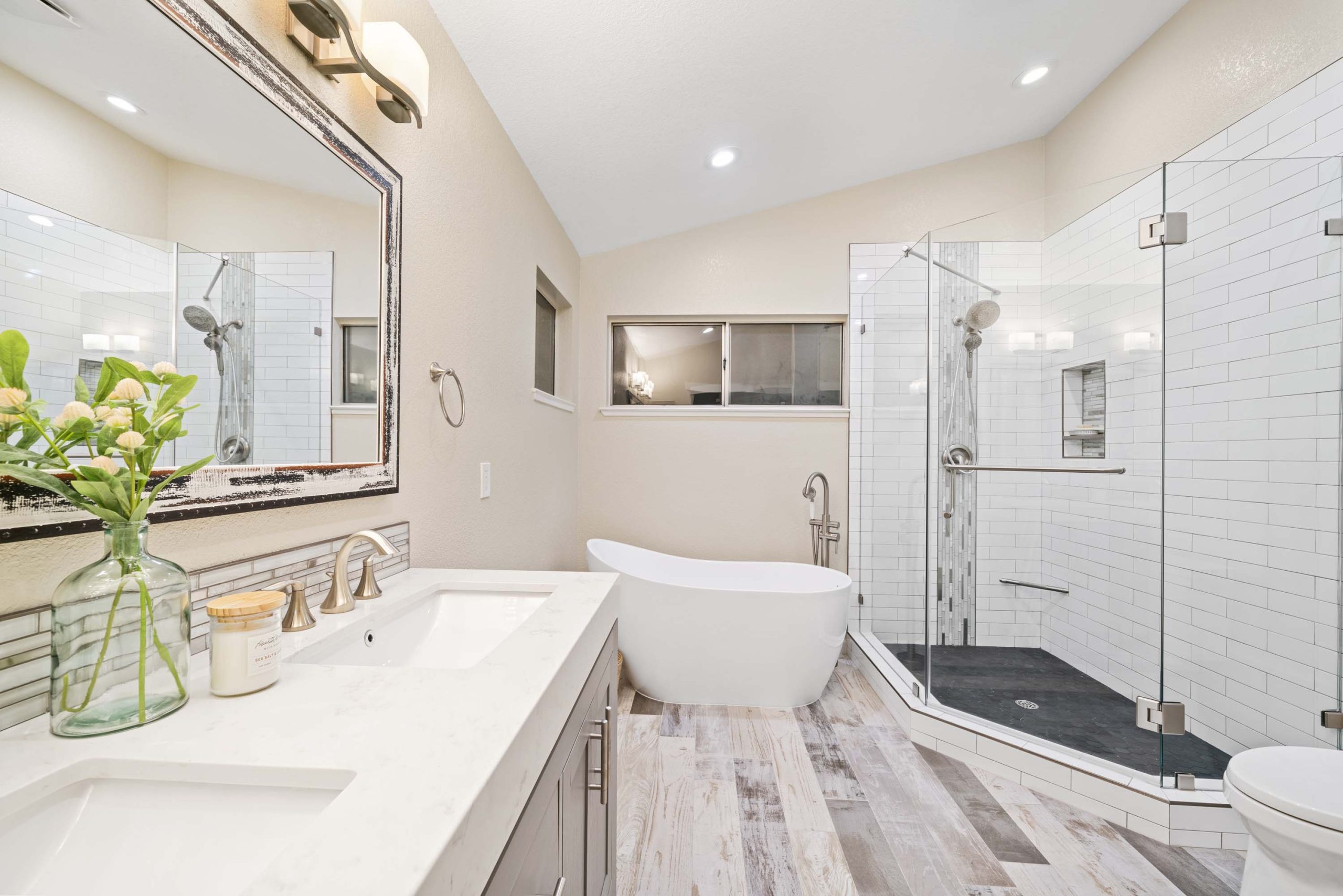 Master bathroom overview showing vanity, tub, and walk-in shower in Roseville, CA 95678