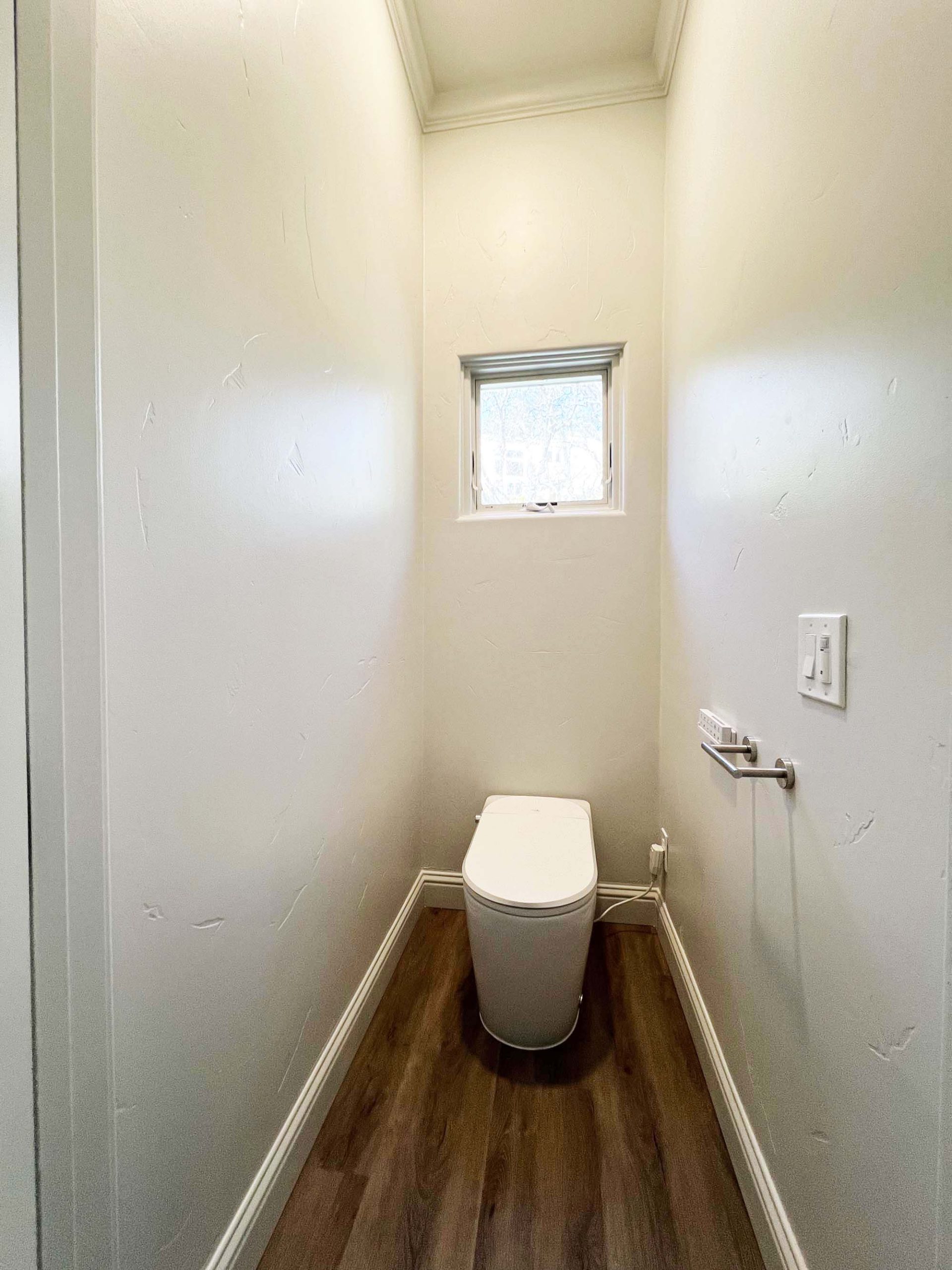 Private water closet with updated flooring and ventilation in a Granite Bay, CA 95746 master bathroom remodel