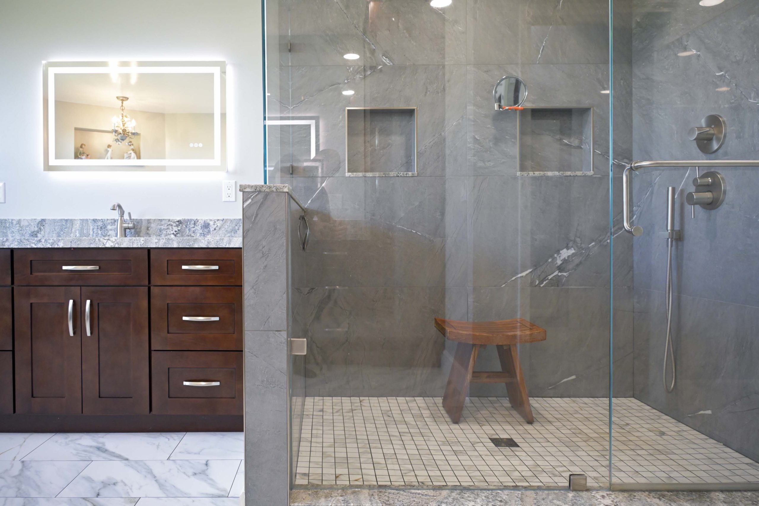 Custom walk in shower and dark wood bathroom vanity in a master bathroom remodel in Rocklin, CA 95765